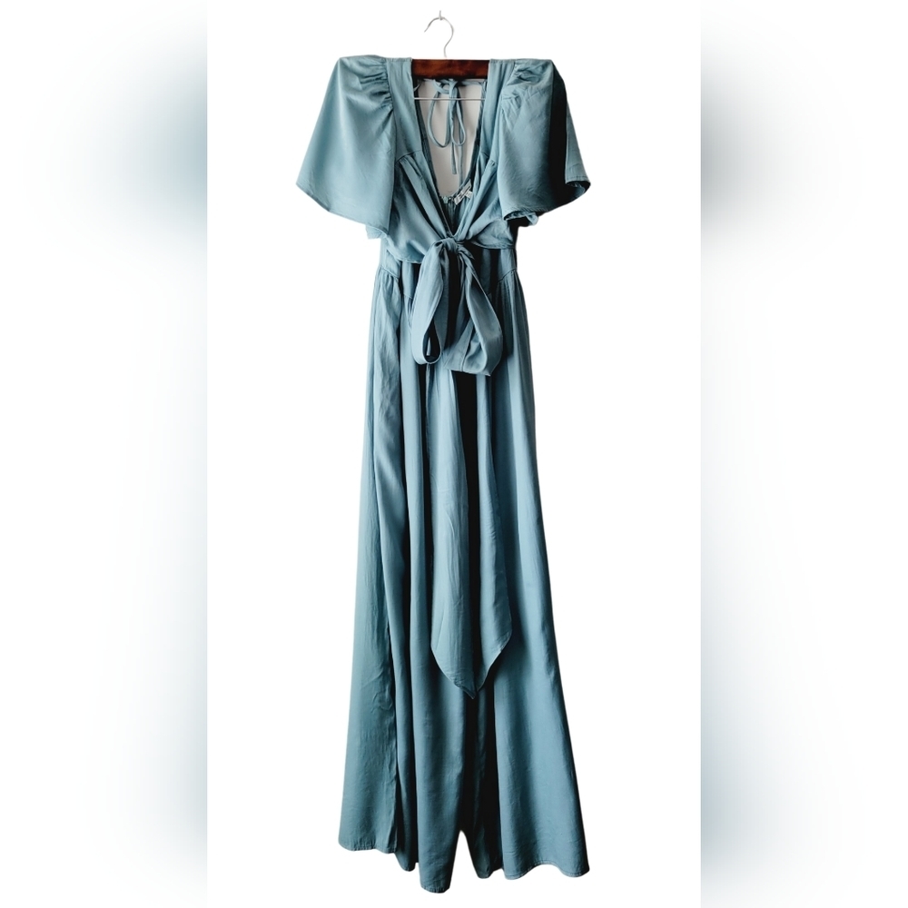 The clothing company long angel sleeves teal color romper size L